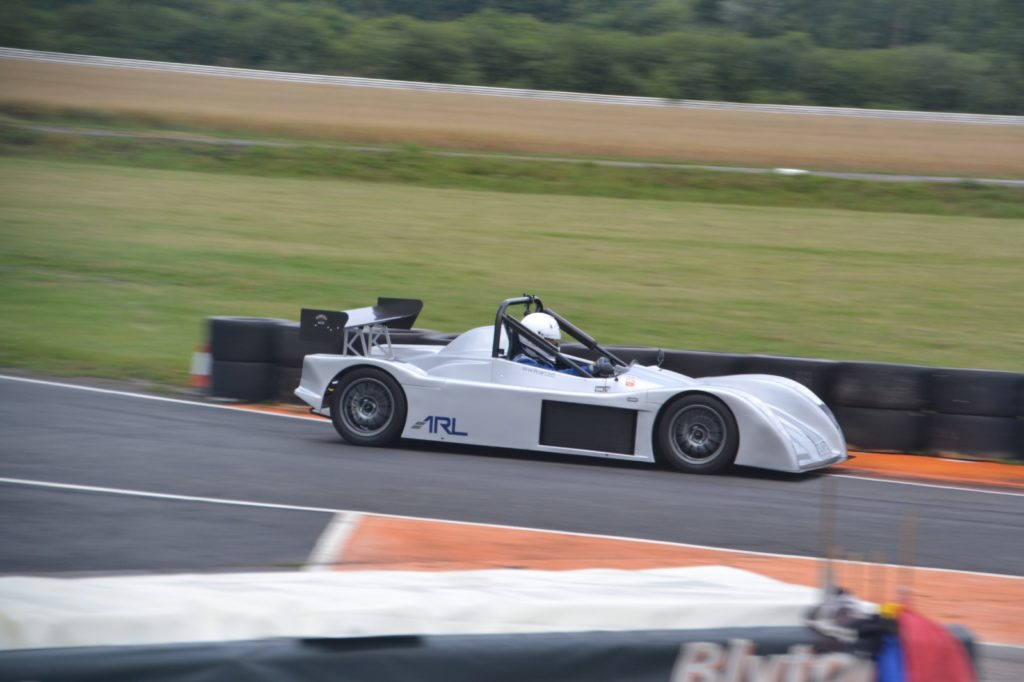 Aardvark Racing SP-1 on the race track, demonstrating its track-focused performance and dynamic design.